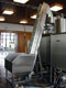 Capper, hopper and elevator